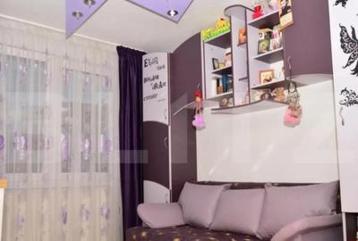 Apartament cu 4 camere decomandat în Tractorul - 1