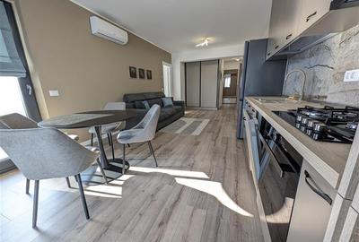 Bloc nou - langa Universitatea Bacovia  si Primarie - 2 camere - mobilat si util - 3