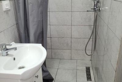 Garsonieră decomandată în Central - 7