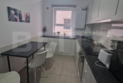 Apartament cu 3 camere, 76 mp, decomandat, loc de parcare - Tractorul - 2