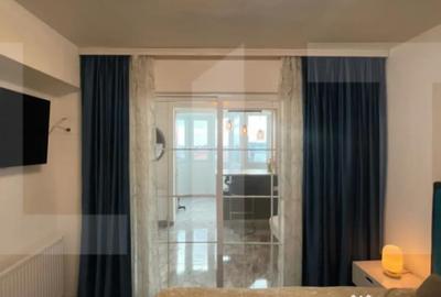 Garsonieră decomandată în P-ța Unirii - 1