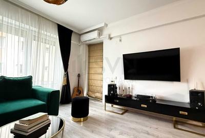 Apartament cu 2 camere semidecomandat, mobilat în Central