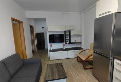 Apartament cu 2 camere semidecomandat, mobilat în Central