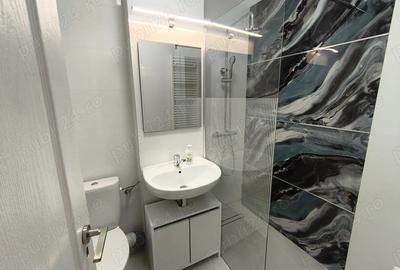 Garsonieră decomandată în Central - 7