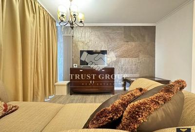 Apartament cu 3 camere semidecomandat, mobilat în P-ța Victoriei