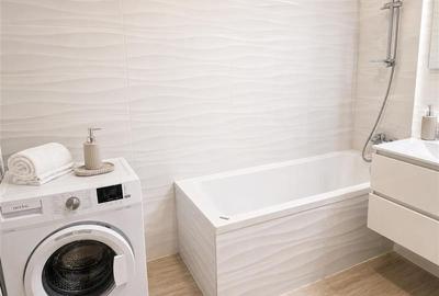 Apartament cu 2 camere semidecomandat, mobilat în Tractorul - 20