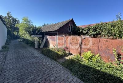 Casa de vanzare 3 camere 110 mpu teren liber 198 mp si garaj Fagaras - 1