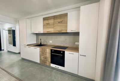 Apartament  cu 2 camere de inchiriat in zona Tractorul Coresi cu dressing,parter - 5