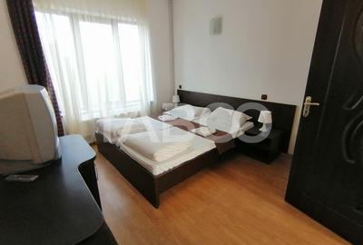 Pensiune 13 camere 16 bai sauna piscina si teren 1565 mp Cisnadioara - 31