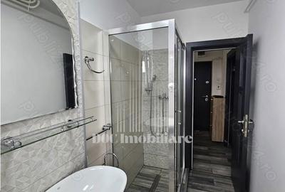 Garsonieră decomandată în Titan