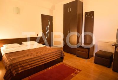 Pensiune 13 camere 16 bai sauna piscina si teren 1565 mp Cisnadioara - 3