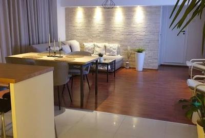 Apartament cu 4 camere semidecomandat, mobilat în Berceni - 1