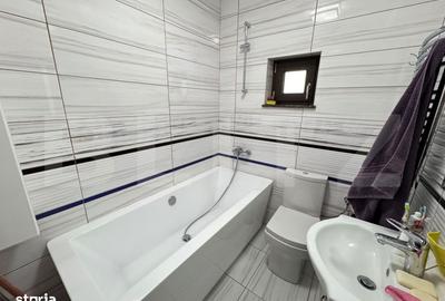 Casă cu 5 camere cu Teren 300 Mp în Ghercești - 1