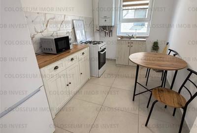 Apartament cu 3 camere decomandat în Tractorul - 2