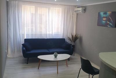 Garsonieră decomandată în Țiglina 1 - 4