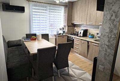 Apartament cu 3 camere semidecomandat, mobilat în Baciu