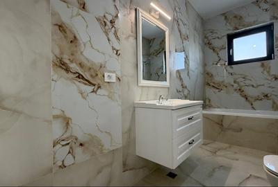 Casă individuală cu 4 camere cu Teren 400 Mp în Balotești - 12