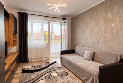 Apartament cu 2 camere semidecomandat, mobilat în Central