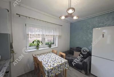 Garsonieră decomandată în Cristian - 6