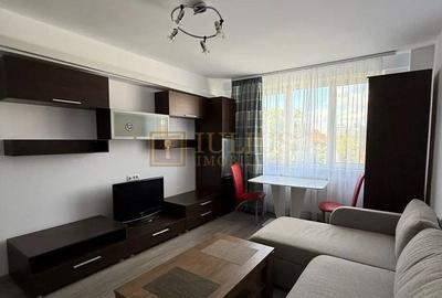 Apartament cu 3 camere semidecomandat, mobilat în Central