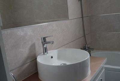 Apartament cu 3 camere decomandat în Tei - 4