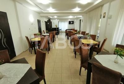 Pensiune 13 camere 16 bai sauna piscina si teren 1565 mp Cisnadioara - 39