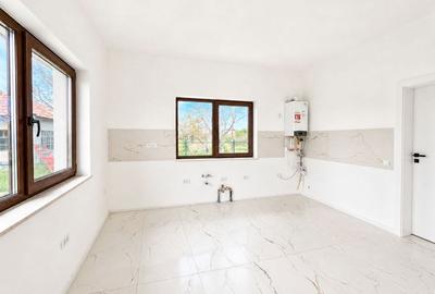 Casă cu 4 camere cu Teren 750 Mp în Jucu
