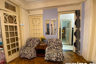 Apartament cu 5 camere semidecomandat, mobilat în P-ța Universității - 14