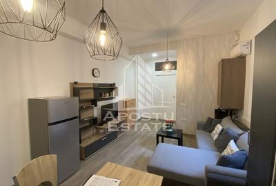 Apartament cu 2 camere semidecomandat, mobilat în Aradului