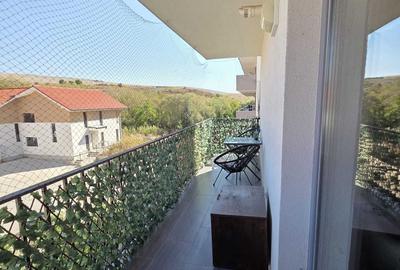 Apartament cu 2 camere semidecomandat în Chinteni