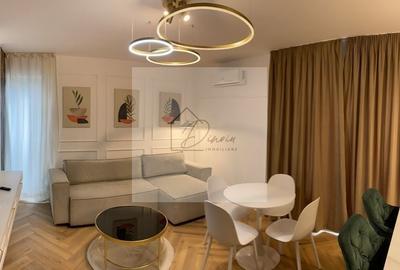 Apartament cu 2 camere semidecomandat, mobilat în Central