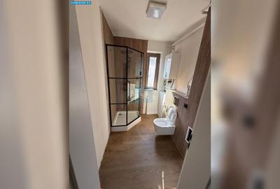 Apartament cu 3 camere semidecomandat în Borhanci