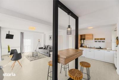 Apartament cu 2 camere decomandat în Tractorul