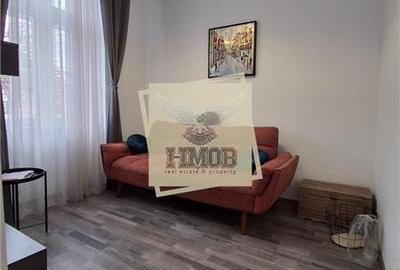 Apartament cu 2 camere semidecomandat, mobilat în Central