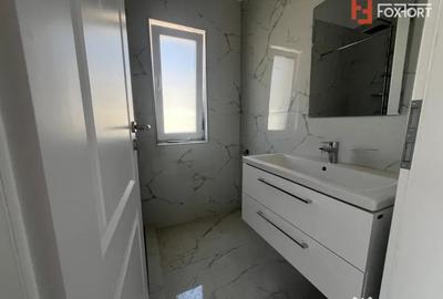 Casă cu 4 camere cu Teren 250 Mp în Moșnița Nouă