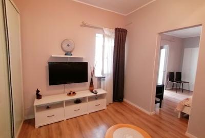 Apartament cu 2 camere semidecomandat, mobilat în Romană