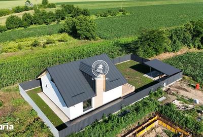 Casă cu 4 camere cu Teren 388 Mp în Holboca - 1