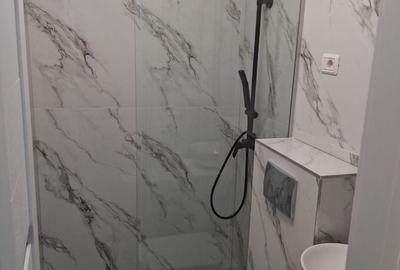 Garsonieră decomandată în Central - 7