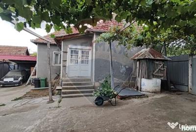 Casă cu 4 camere cu Teren 1710 Mp în Fonău