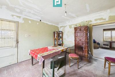 Casă cu Teren 1800 Mp în Buteni