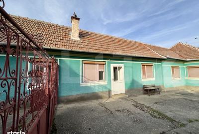 Casă cu 4 camere cu Teren 1220 Mp în Cut