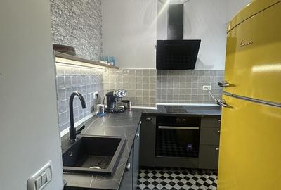 Apartament cu 4 camere decomandat în Calea Victoriei