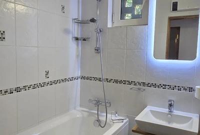 Apartament cu 3 camere semidecomandat în Muncii