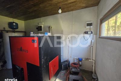 Casă cu 7 camere cu Teren 1000 Mp în Porumbacu de Jos