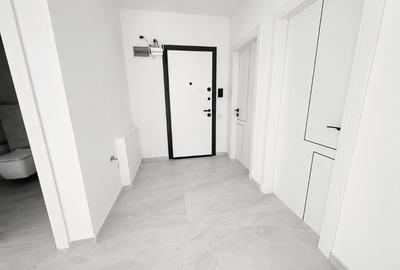 Apartament cu 3 camere decomandat în Cățelu