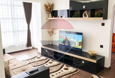 Apartament cu 2 camere semidecomandat, mobilat în Central