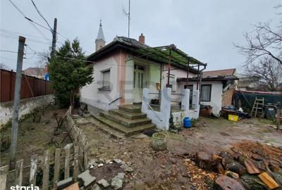 Casă cu 2 camere decomandat cu Teren 257 Mp în Sânmartin