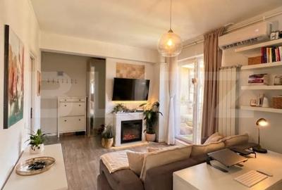 Apartament cu 2 camere semidecomandat, mobilat în Baciu