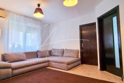 Apartament cu 3 camere semidecomandat, mobilat în Central