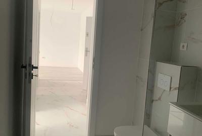 Apartament cu 2 camere decomandat în Tunari - 2